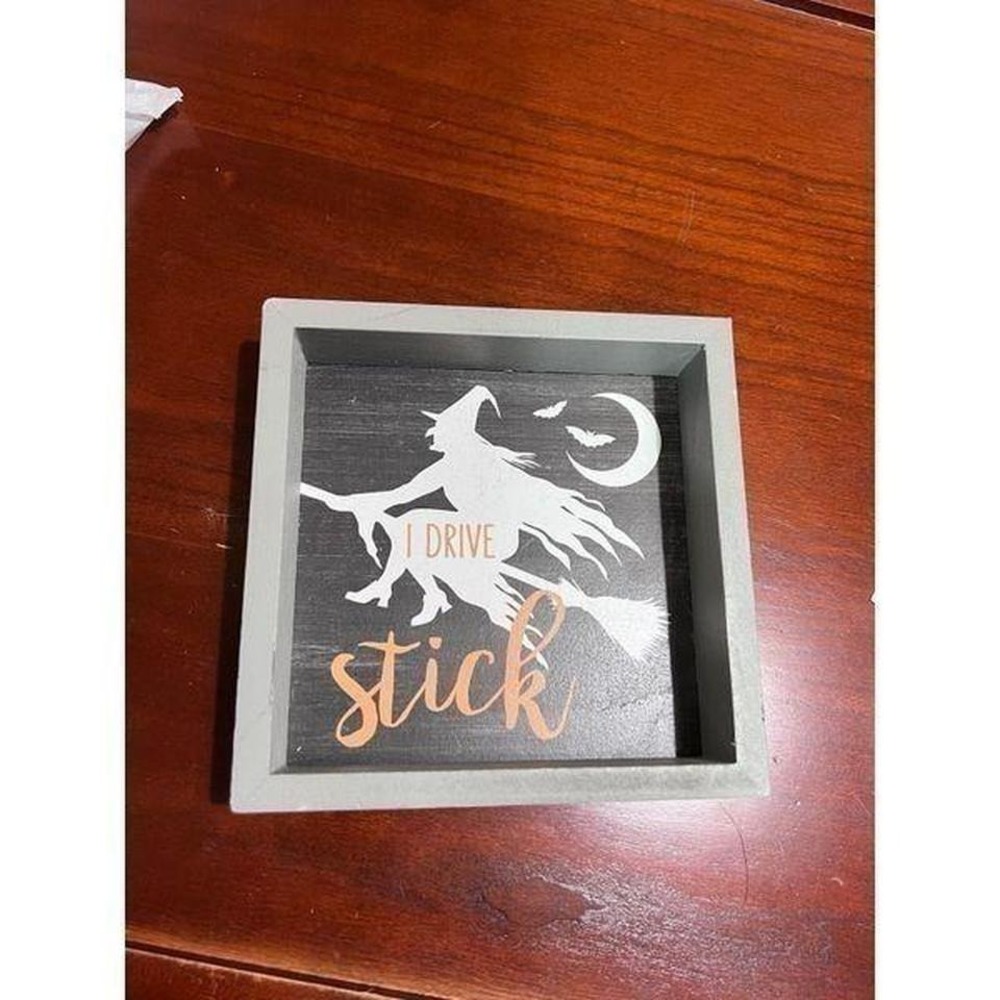 I drive stick witch sign